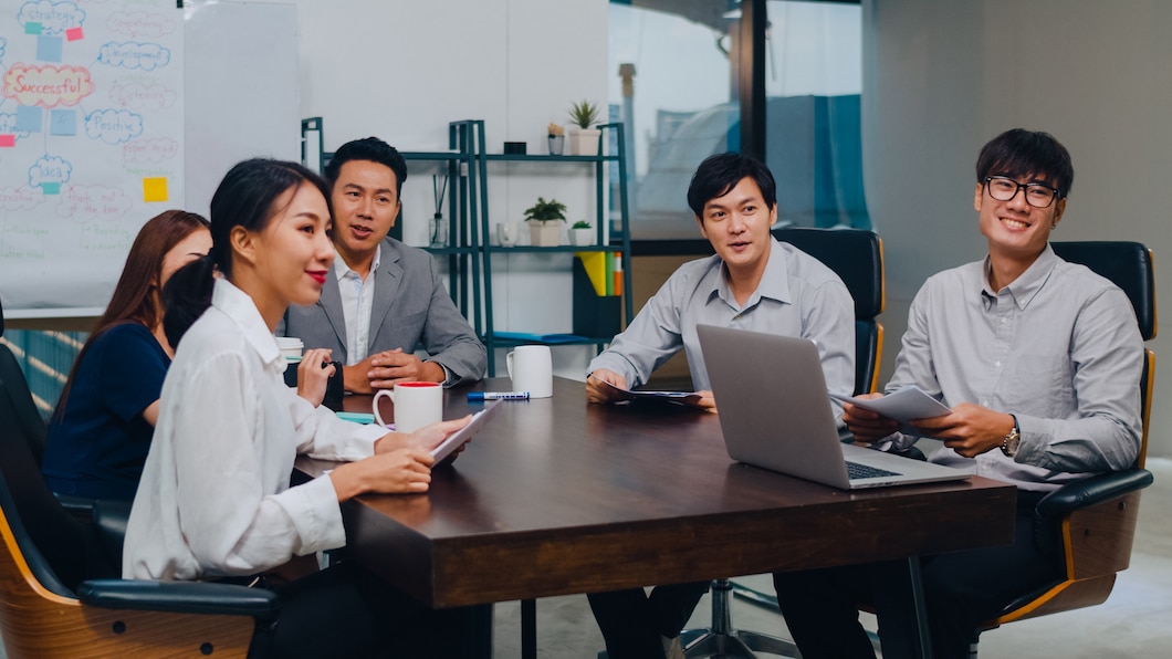 millennial-asia-businessmen-businesswomen-having-conference-video-call-meeting-brainstorming-ideas-about-new-project-colleagues-working-together-planning-strategy-enjoy-teamwork-modern-office_7