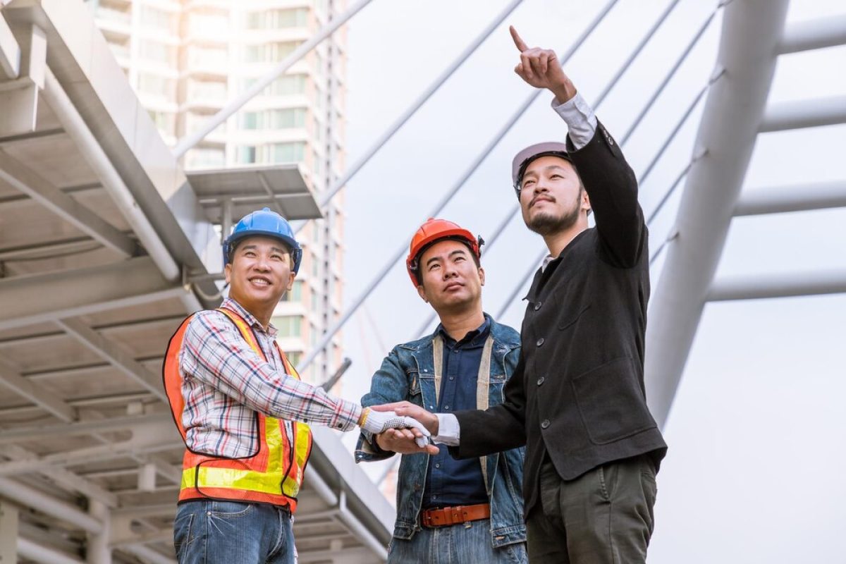 manager-meeting-with-engineer-outdoor-site-stack-hand-teamwork_554837-414